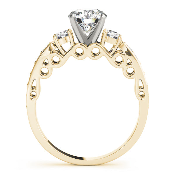 Gold ring with a diamond on a white background
