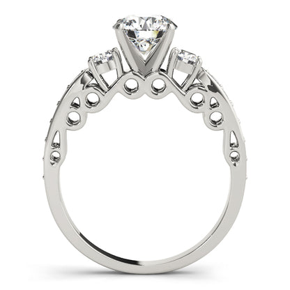 Diamond ring with three clear gemstones on a white background