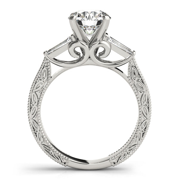 Silver ring with intricate design and a central diamond on a white background