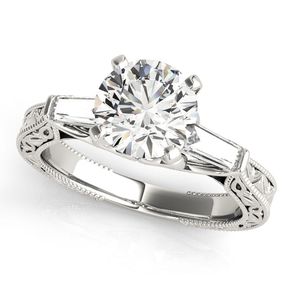 Diamond ring with intricate band on a white background