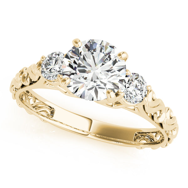 Gold ring with three diamonds on a white background