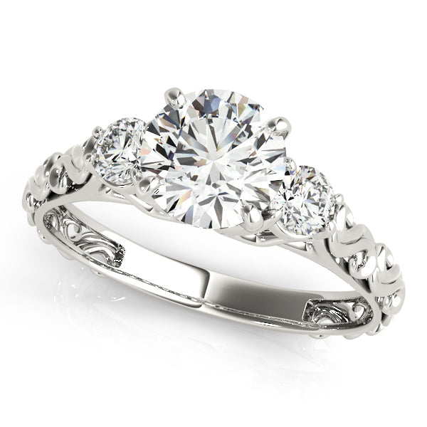 Diamond ring with three circular diamonds on a white background