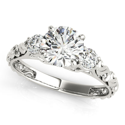 Diamond ring with three circular diamonds on a white background