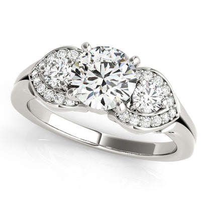 Diamond ring with three circular diamonds on a white background