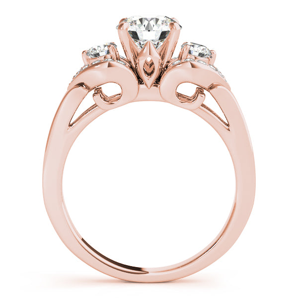 Rose gold ring with a central diamond and smaller diamonds on a white gold