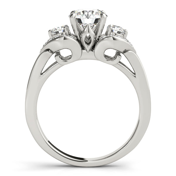 Diamond ring with three stones on a white background