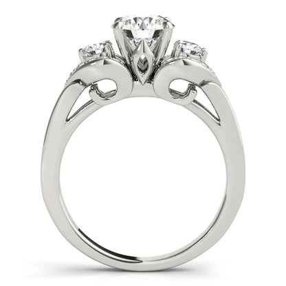 Diamond ring with three stones on a white background