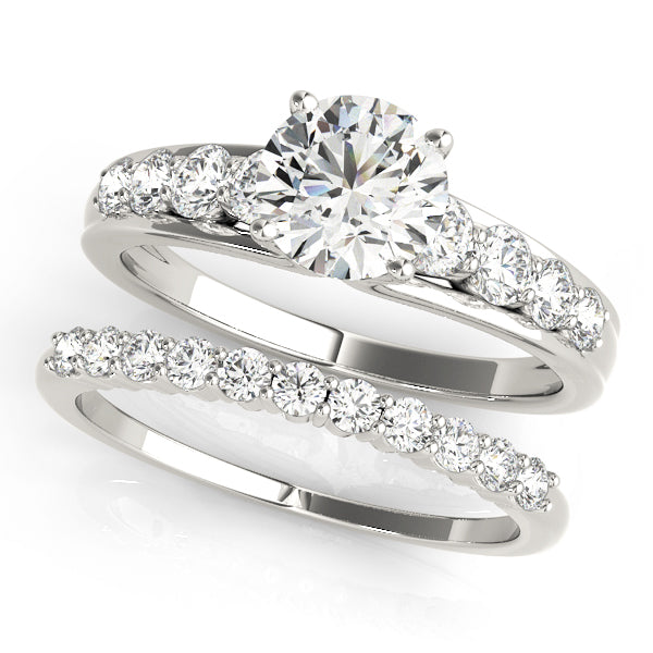 Iconic Prong-Set Round Diamond Engagement Ring — 9K/18K Gold & Platinum