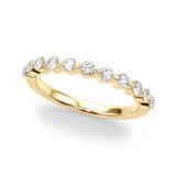 Single Shared Prong Half Eternity Ring in Gold & Platinum