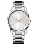 Calvin Klein watch with silver metal band on a white background