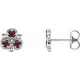 Mozambique Garnet Round Three-Stone Stud Earrings in Gold and Platinum