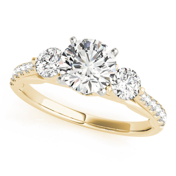 Gold ring with three diamonds on a white background