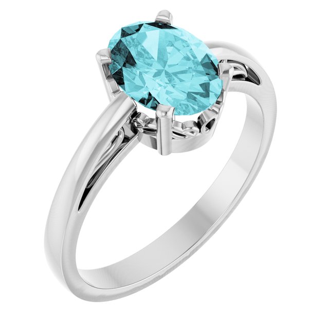 Oval Blue Zircon Solitaire Ring in Gold