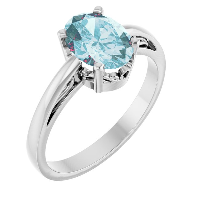 Oval Sky Blue Topaz Solitaire Ring in Gold