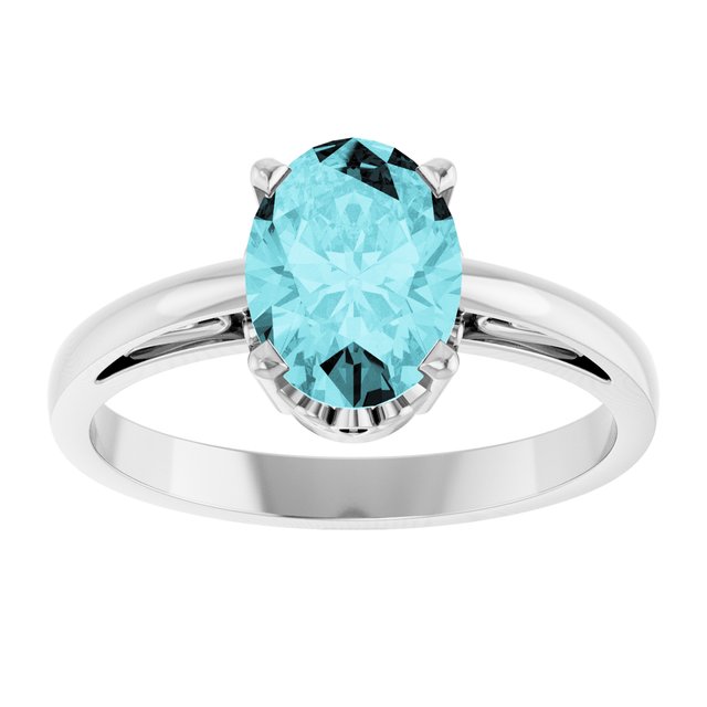 Oval Blue Zircon Solitaire Ring in Gold