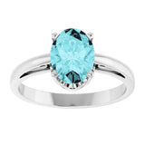 Oval Blue Zircon Solitaire Ring in Gold