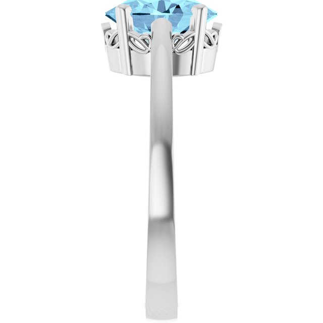 Oval Aquamarine Solitaire Ring in Gold