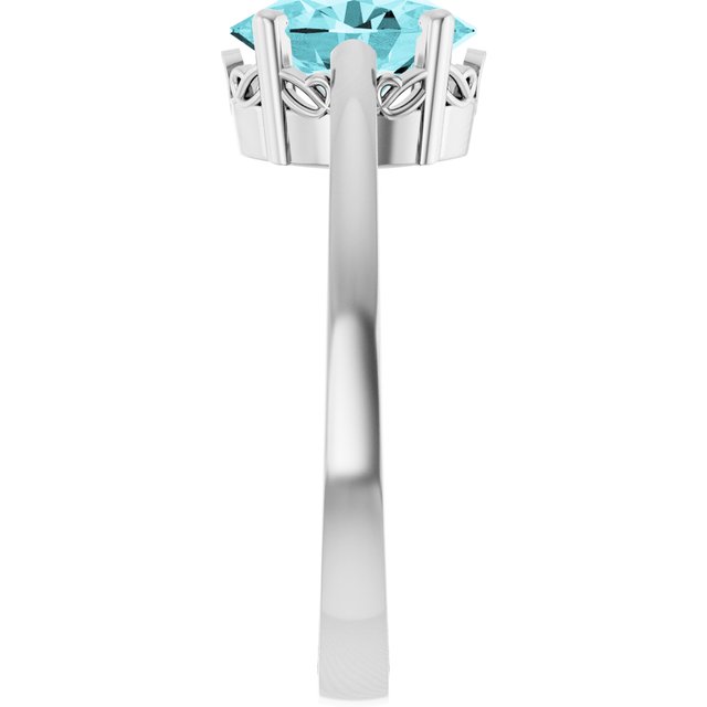 Oval Blue Zircon Solitaire Ring in Gold