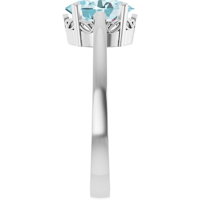 Oval Sky Blue Topaz Solitaire Ring in Gold