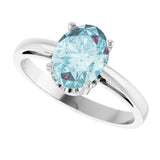 Oval Sky Blue Topaz Solitaire Ring in Gold