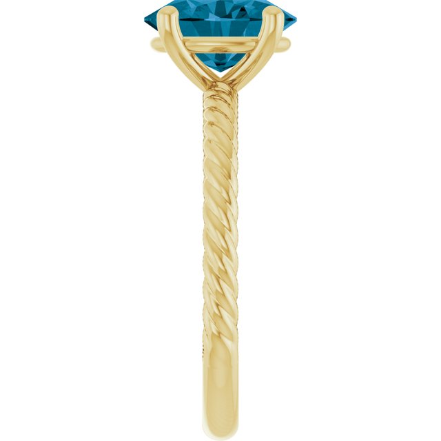 Oval London Blue Topaz Solitaire Ring in Gold