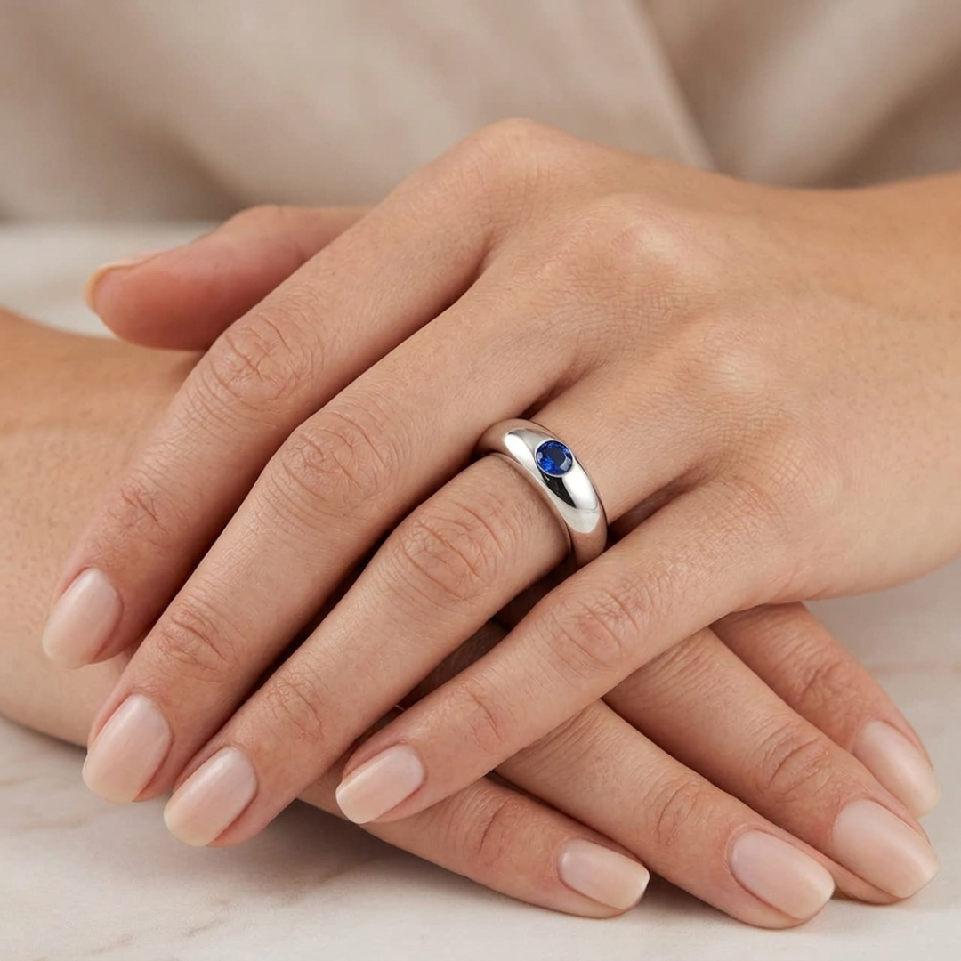 Oval Blue Sapphire Solitaire Ring in Gold and Platinum