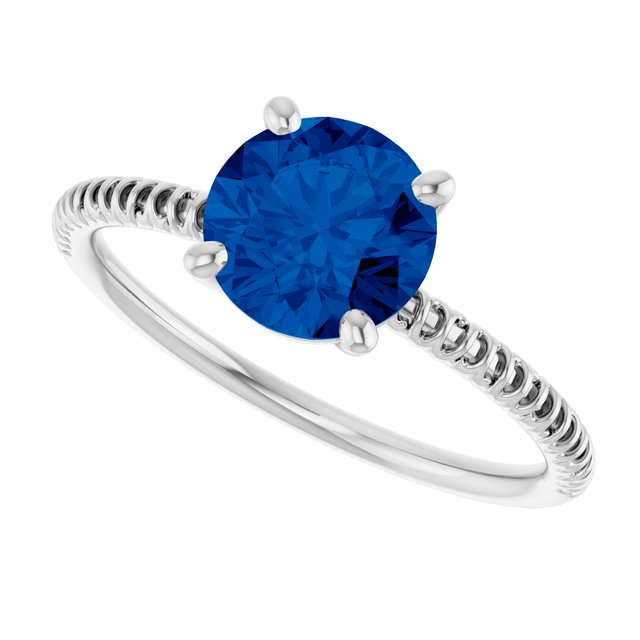 Round Lab-Grown Blue Sapphire Accented Ring in Gold