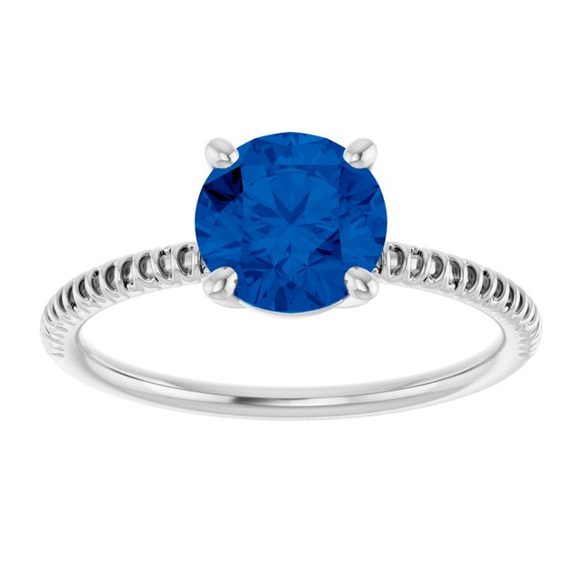 Round Lab-Grown Blue Sapphire Accented Ring in Gold