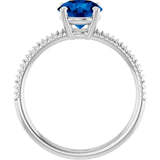 Round Lab-Grown Blue Sapphire Accented Ring in Gold