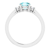 Round Blue Zircon Accented Ring with Diamond Accents in Gold