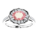 Oval Peach Mandganite & Diamond Halo Ring in Gold and Platinum