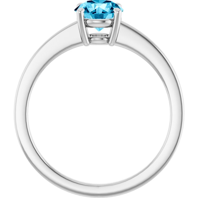 Round Aquamarine Solitaire Ring in Gold and Platinum