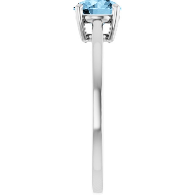 Round Sky Blue Topaz Solitaire Ring in Gold and Platinum