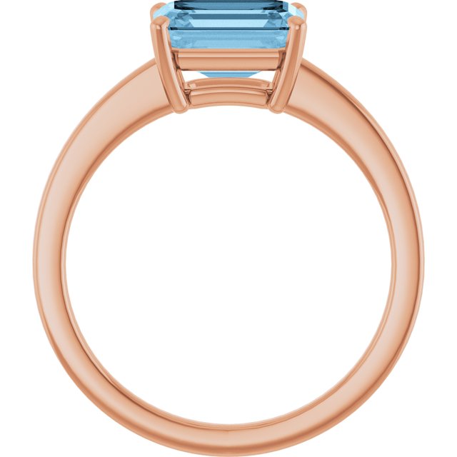 Emerald Sky Blue Topaz Solitaire Ring in Gold and Platinum