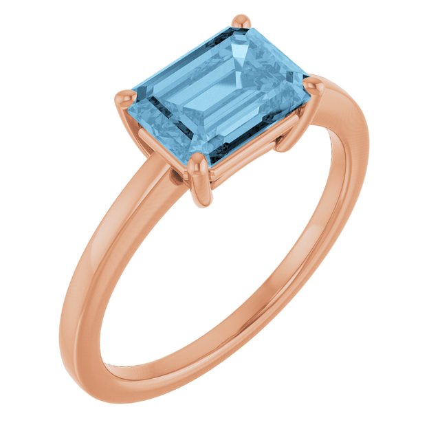 Emerald Sky Blue Topaz Solitaire Ring in Gold and Platinum