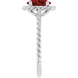 Oval Mozambique Garnet Solitaire Ring in Gold and Platinum