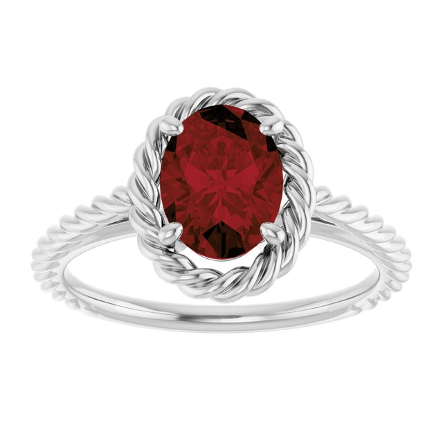 Oval Mozambique Garnet Solitaire Ring in Gold and Platinum