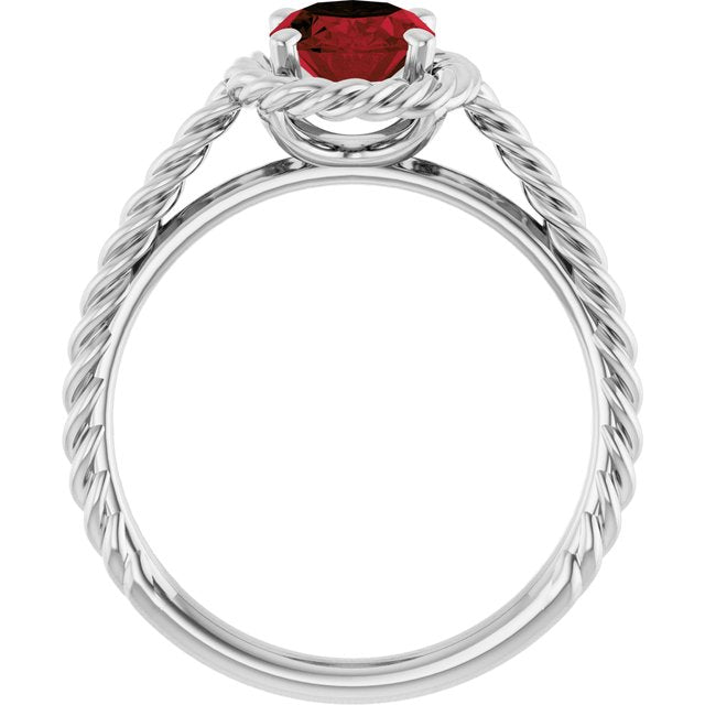 Oval Mozambique Garnet Solitaire Ring in Gold and Platinum