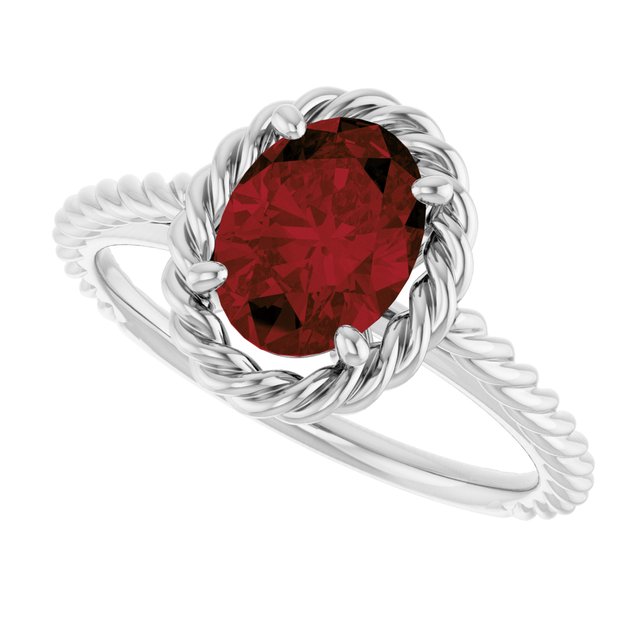 Oval Mozambique Garnet Solitaire Ring in Gold and Platinum