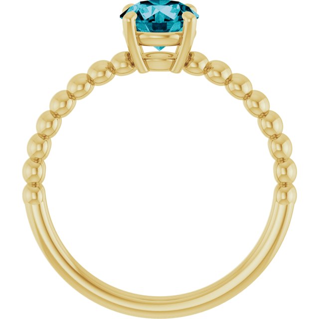 Round London Blue Topaz Solitaire Ring in Gold and Platinum