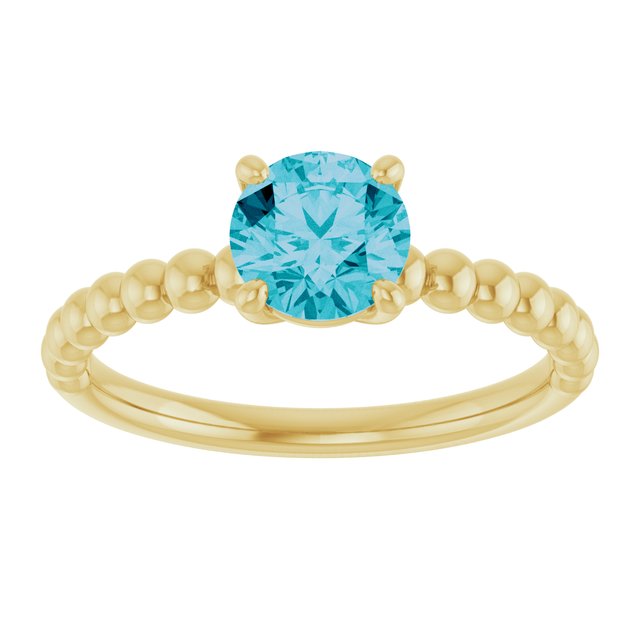 Round London Blue Topaz Solitaire Ring in Gold and Platinum