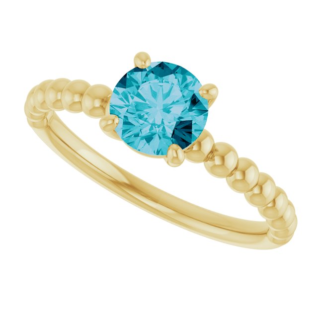 Round London Blue Topaz Solitaire Ring in Gold and Platinum