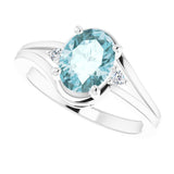 Oval Sky Blue Topaz & Diamond Accented Ring in White Gold