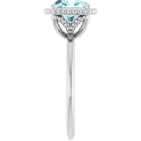 Cushion Sky Blue Topaz Solitaire Ring in Gold and Platinum