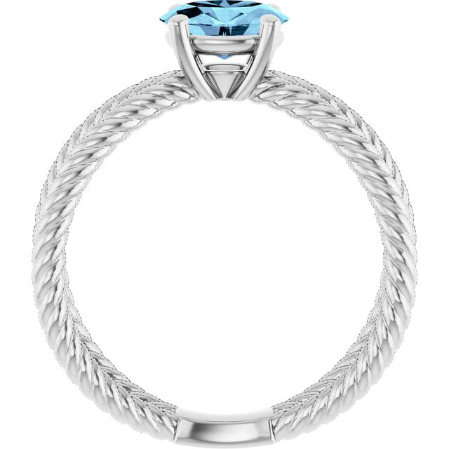 Oval Aquamarine Solitaire Ring in Gold and Platinum