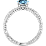 Oval Aquamarine Solitaire Ring in Gold and Platinum