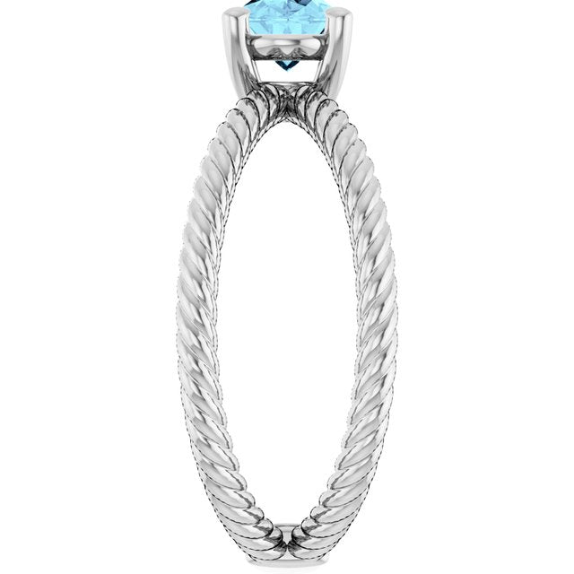 Oval Aquamarine Solitaire Ring in Gold and Platinum