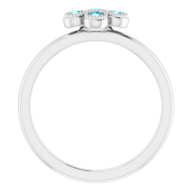 Round Aquamarine Accented Ring in Gold and Platinum