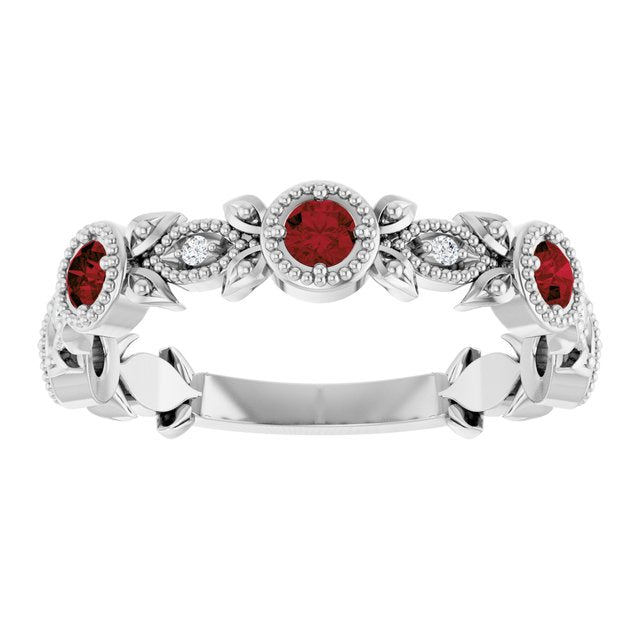 Round Mozambique Garnet & Diamond Ring in Gold and Platinum