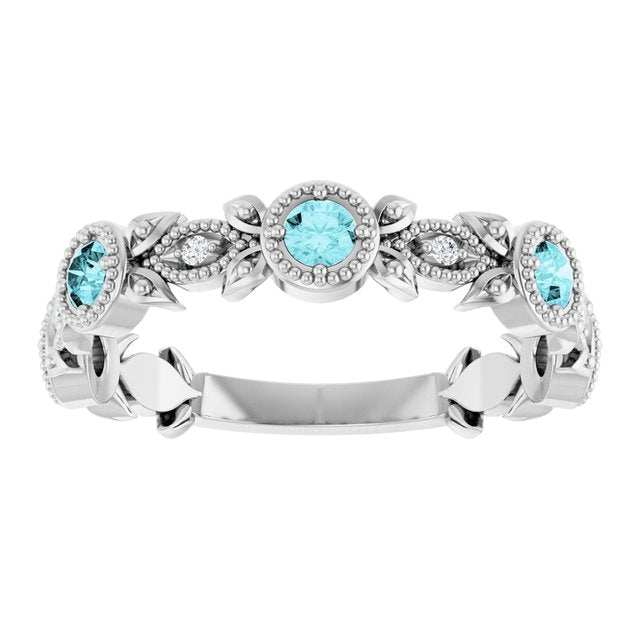 Round Blue Zircon & Diamond Accented Ring in Gold and Platinum
